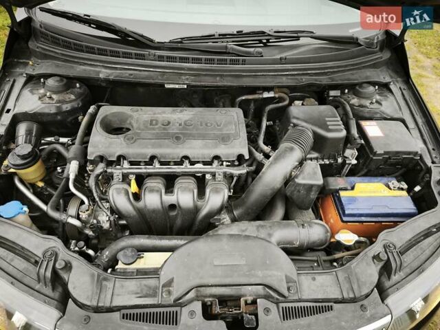 Черный Киа Черато, объемом двигателя 2 л и пробегом 96 тыс. км за 8500 $, фото 14 на Automoto.ua