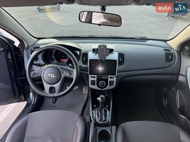 Черный Киа Черато, объемом двигателя 2 л и пробегом 183 тыс. км за 8299 $, фото 12 на Automoto.ua
