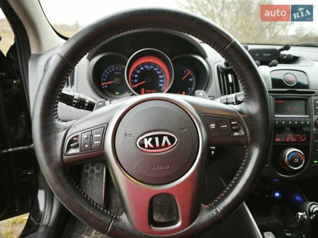 Черный Киа Черато, объемом двигателя 2 л и пробегом 96 тыс. км за 8500 $, фото 12 на Automoto.ua