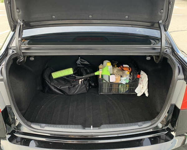 Черный Киа Черато, объемом двигателя 2 л и пробегом 175 тыс. км за 9400 $, фото 15 на Automoto.ua