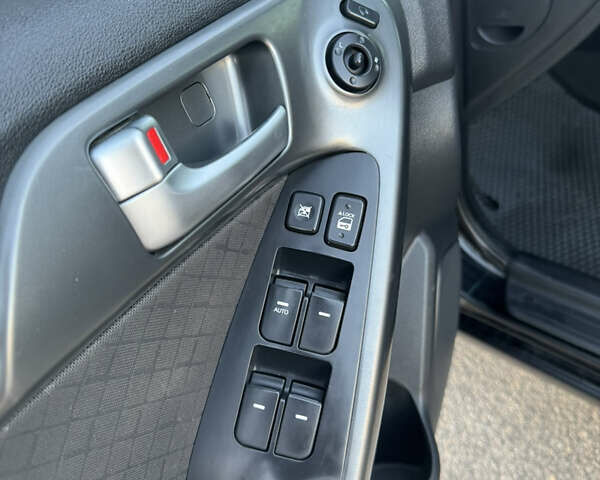 Черный Киа Черато, объемом двигателя 2 л и пробегом 183 тыс. км за 8299 $, фото 14 на Automoto.ua