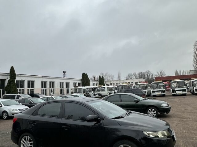 Черный Киа Черато, объемом двигателя 2 л и пробегом 300 тыс. км за 5499 $, фото 2 на Automoto.ua