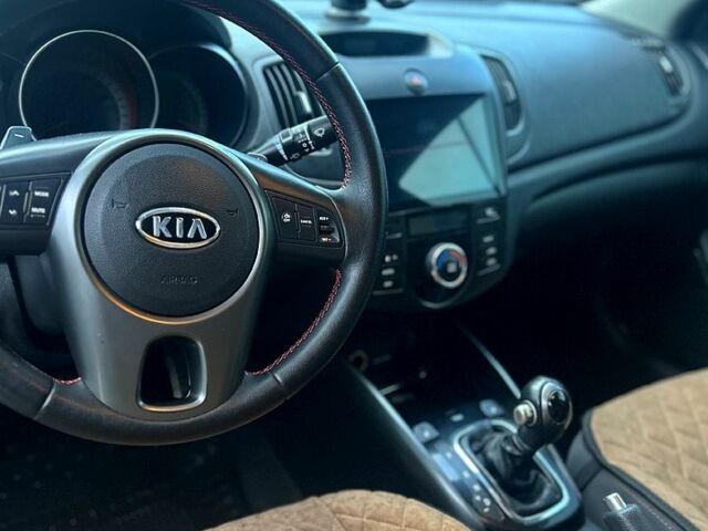 Чорний Кіа Черато, об'ємом двигуна 2 л та пробігом 225 тис. км за 7400 $, фото 2 на Automoto.ua