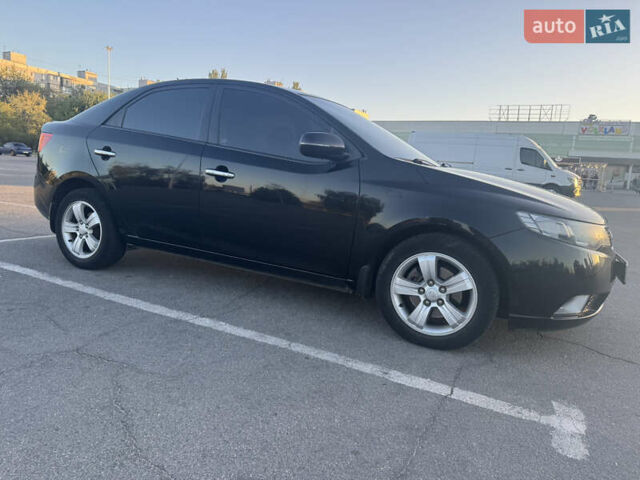 Черный Киа Черато, объемом двигателя 2 л и пробегом 183 тыс. км за 8299 $, фото 2 на Automoto.ua