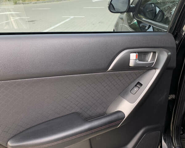 Черный Киа Черато, объемом двигателя 2 л и пробегом 175 тыс. км за 9400 $, фото 8 на Automoto.ua