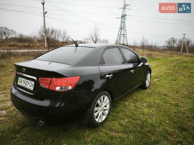 Черный Киа Черато, объемом двигателя 2 л и пробегом 96 тыс. км за 8500 $, фото 4 на Automoto.ua