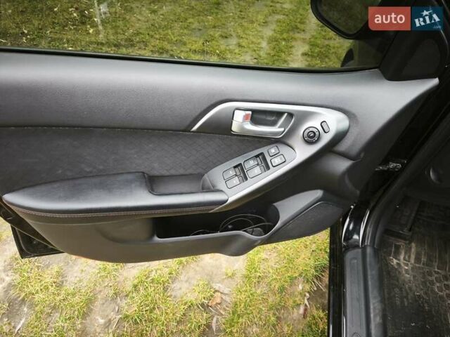 Черный Киа Черато, объемом двигателя 2 л и пробегом 96 тыс. км за 8500 $, фото 13 на Automoto.ua