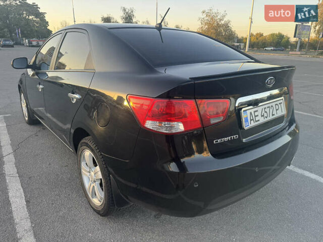 Черный Киа Черато, объемом двигателя 2 л и пробегом 183 тыс. км за 8299 $, фото 6 на Automoto.ua