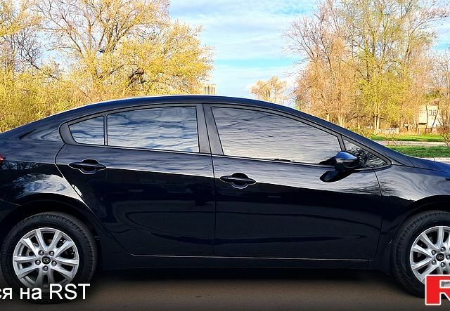 Чорний Кіа Черато, об'ємом двигуна 16 л та пробігом 74 тис. км за 8400 $, фото 3 на Automoto.ua