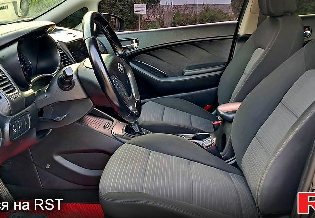 Чорний Кіа Черато, об'ємом двигуна 16 л та пробігом 74 тис. км за 8400 $, фото 5 на Automoto.ua