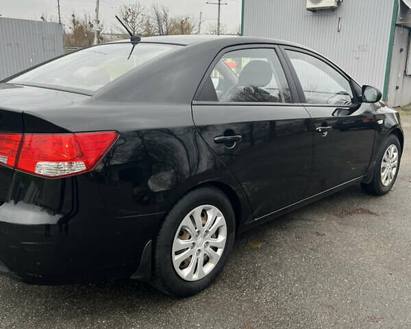 Чорний Кіа Черато, об'ємом двигуна 1.59 л та пробігом 170 тис. км за 7450 $, фото 3 на Automoto.ua