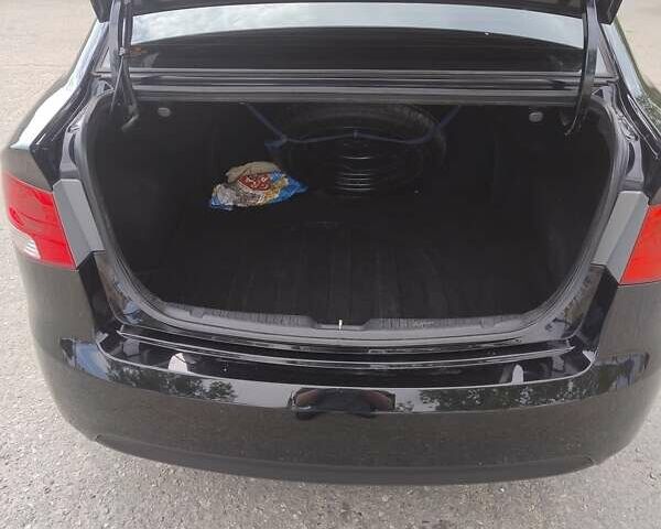 Черный Киа Черато, объемом двигателя 1.59 л и пробегом 175 тыс. км за 7300 $, фото 8 на Automoto.ua