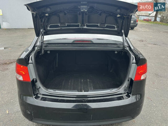 Чорний Кіа Черато, об'ємом двигуна 1.59 л та пробігом 170 тис. км за 7450 $, фото 12 на Automoto.ua