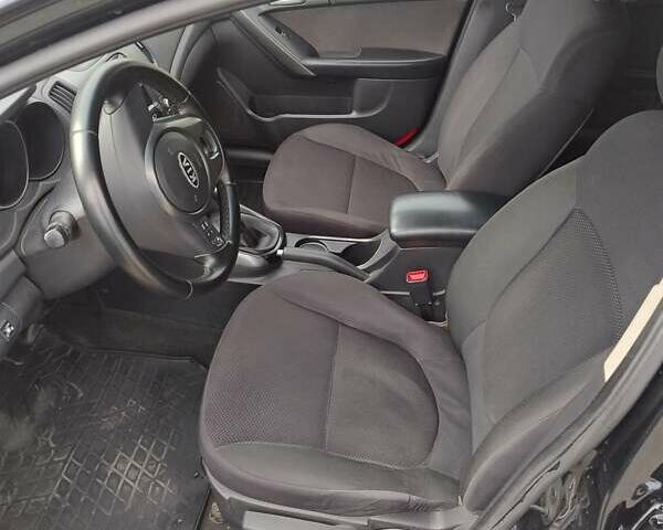 Черный Киа Черато, объемом двигателя 1.59 л и пробегом 175 тыс. км за 7300 $, фото 4 на Automoto.ua