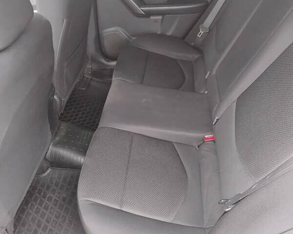 Черный Киа Черато, объемом двигателя 1.59 л и пробегом 175 тыс. км за 7300 $, фото 5 на Automoto.ua