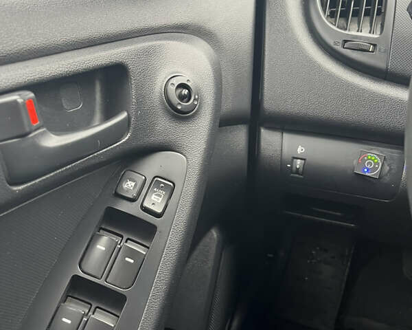 Чорний Кіа Черато, об'ємом двигуна 1.59 л та пробігом 170 тис. км за 7450 $, фото 8 на Automoto.ua