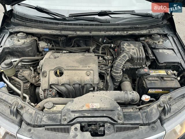 Чорний Кіа Черато, об'ємом двигуна 1.59 л та пробігом 170 тис. км за 7450 $, фото 13 на Automoto.ua