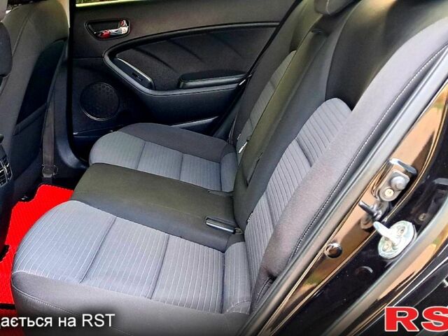 Чорний Кіа Черато, об'ємом двигуна 16 л та пробігом 74 тис. км за 8400 $, фото 8 на Automoto.ua