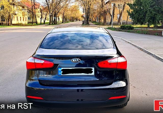 Чорний Кіа Черато, об'ємом двигуна 16 л та пробігом 74 тис. км за 8400 $, фото 4 на Automoto.ua