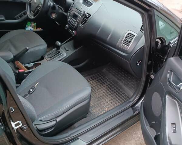 Черный Киа Черато, объемом двигателя 1.59 л и пробегом 139 тыс. км за 8600 $, фото 1 на Automoto.ua