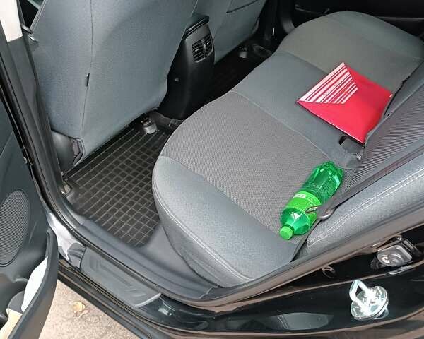 Черный Киа Черато, объемом двигателя 1.6 л и пробегом 139 тыс. км за 8600 $, фото 4 на Automoto.ua