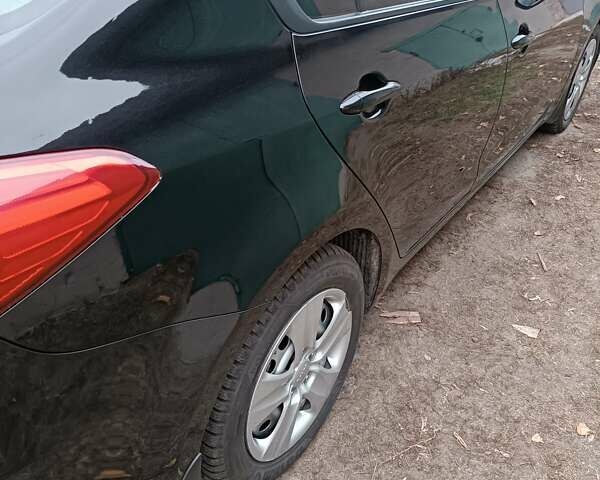 Черный Киа Черато, объемом двигателя 1.59 л и пробегом 139 тыс. км за 8600 $, фото 2 на Automoto.ua