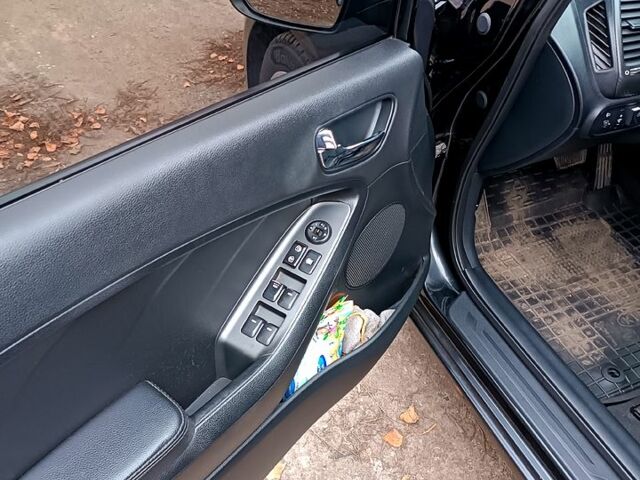 Чорний Кіа Черато, об'ємом двигуна 1.6 л та пробігом 140 тис. км за 8600 $, фото 4 на Automoto.ua