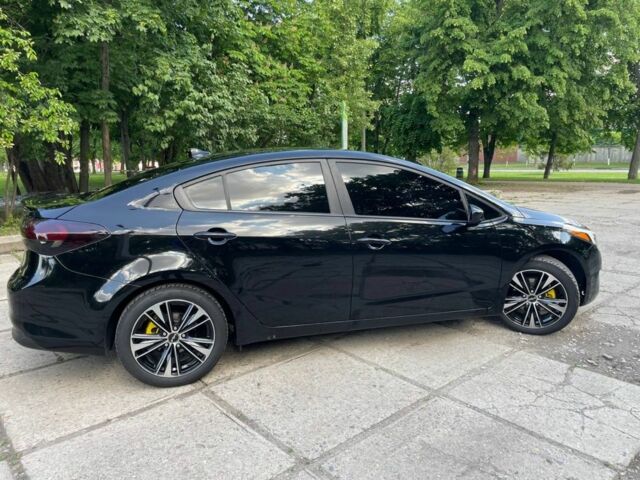 Чорний Кіа Черато, об'ємом двигуна 2 л та пробігом 167 тис. км за 10000 $, фото 4 на Automoto.ua