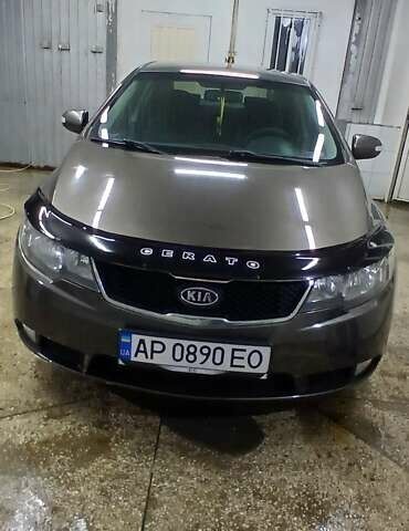 Коричневый Киа Черато, объемом двигателя 2 л и пробегом 250 тыс. км за 7200 $, фото 1 на Automoto.ua