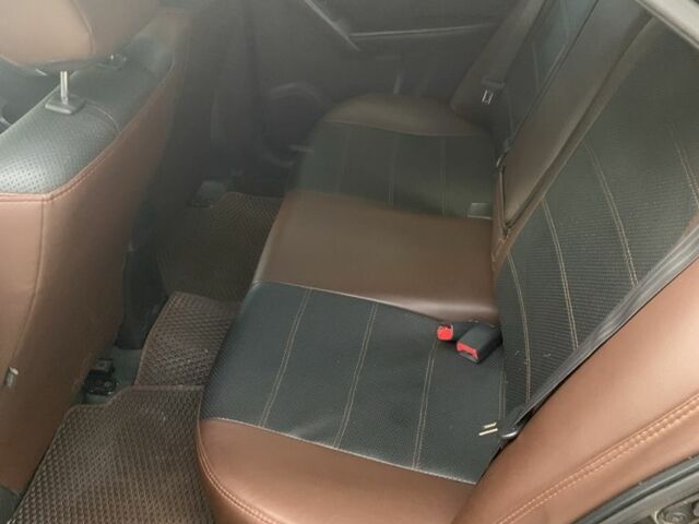 Коричневый Киа Черато, объемом двигателя 1.6 л и пробегом 270 тыс. км за 7500 $, фото 6 на Automoto.ua