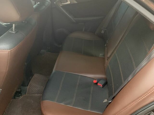 Коричневый Киа Черато, объемом двигателя 1.6 л и пробегом 270 тыс. км за 7500 $, фото 5 на Automoto.ua