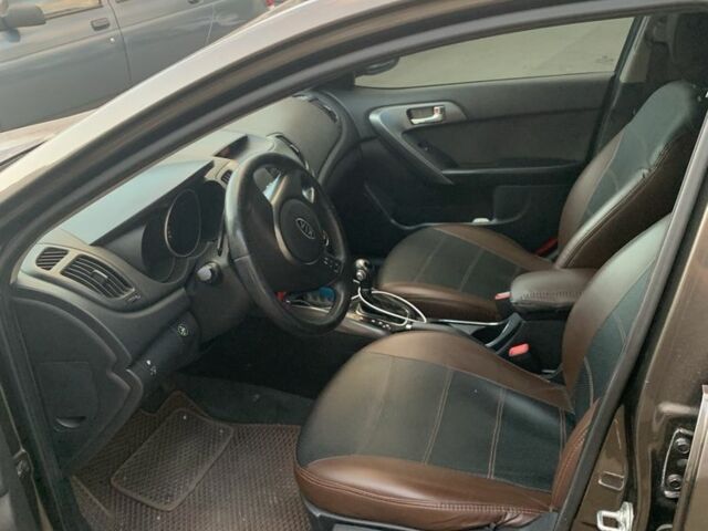 Коричневый Киа Черато, объемом двигателя 1.6 л и пробегом 270 тыс. км за 7500 $, фото 7 на Automoto.ua