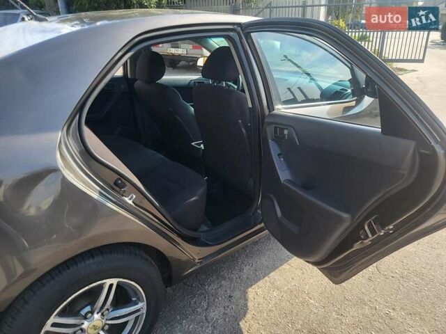 Коричневий Кіа Черато, об'ємом двигуна 1.6 л та пробігом 110 тис. км за 4799 $, фото 14 на Automoto.ua