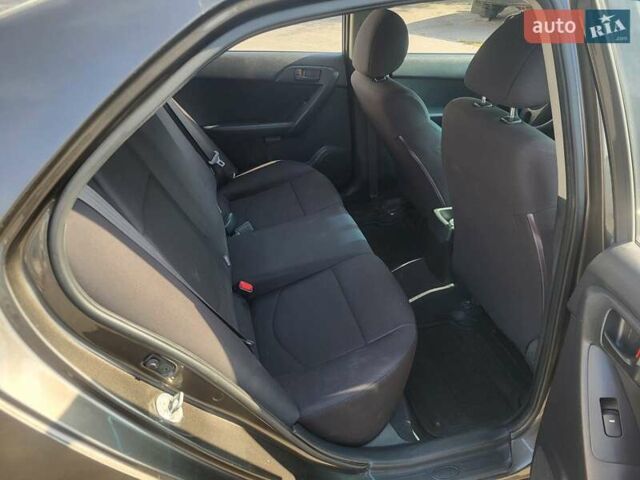 Коричневий Кіа Черато, об'ємом двигуна 1.6 л та пробігом 110 тис. км за 4799 $, фото 15 на Automoto.ua