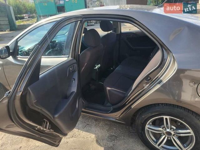 Коричневий Кіа Черато, об'ємом двигуна 1.6 л та пробігом 110 тис. км за 4799 $, фото 11 на Automoto.ua
