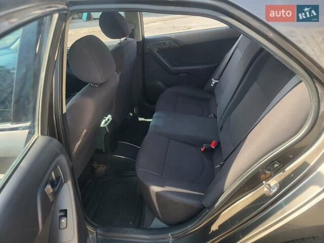 Коричневий Кіа Черато, об'ємом двигуна 1.6 л та пробігом 110 тис. км за 4799 $, фото 10 на Automoto.ua