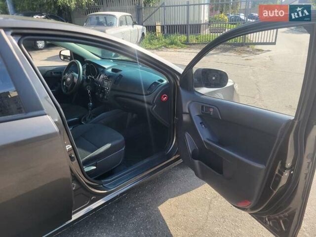 Коричневий Кіа Черато, об'ємом двигуна 1.6 л та пробігом 110 тис. км за 4799 $, фото 18 на Automoto.ua