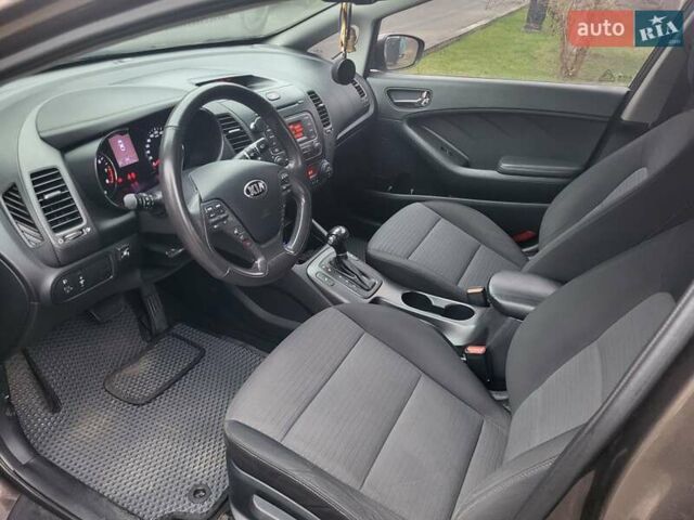 Коричневый Киа Черато, объемом двигателя 1.59 л и пробегом 171 тыс. км за 10500 $, фото 2 на Automoto.ua