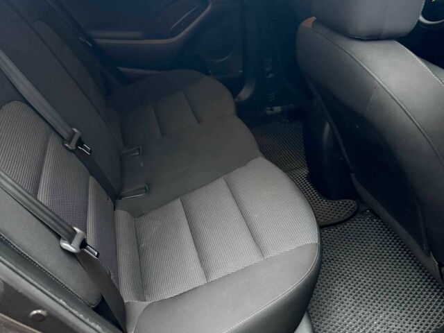 Коричневый Киа Черато, объемом двигателя 2 л и пробегом 107 тыс. км за 11000 $, фото 6 на Automoto.ua
