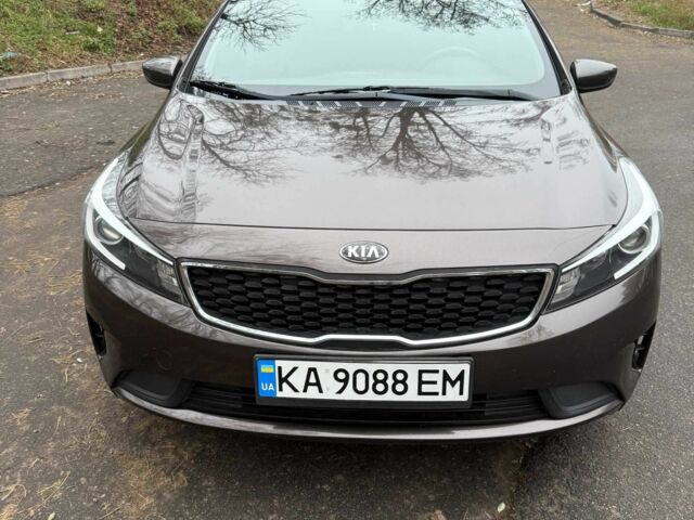 Коричневый Киа Черато, объемом двигателя 2 л и пробегом 107 тыс. км за 11000 $, фото 2 на Automoto.ua