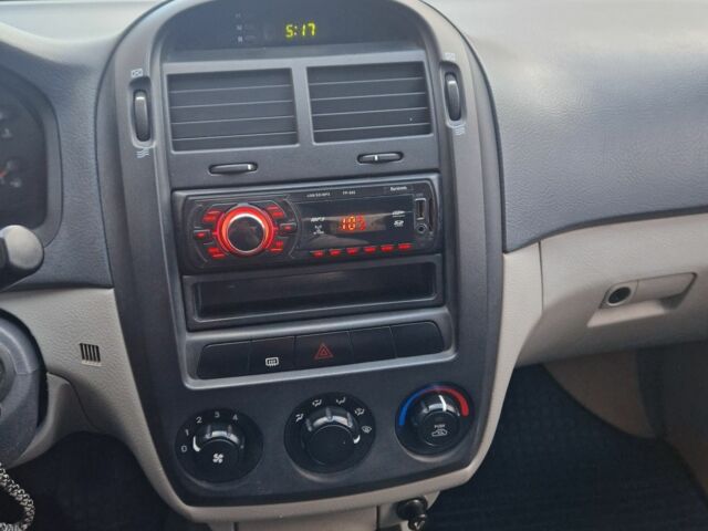 Красный Киа Черато, объемом двигателя 1.6 л и пробегом 260 тыс. км за 3650 $, фото 7 на Automoto.ua