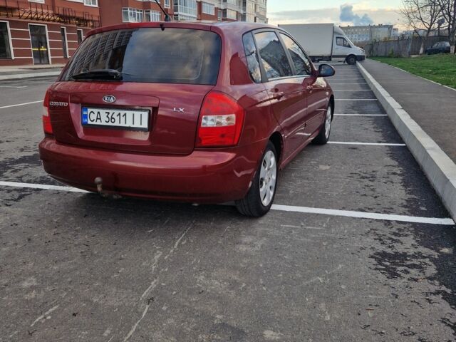 Красный Киа Черато, объемом двигателя 1.6 л и пробегом 260 тыс. км за 3650 $, фото 1 на Automoto.ua