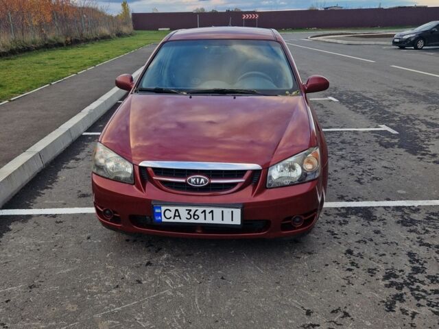 Красный Киа Черато, объемом двигателя 1.6 л и пробегом 260 тыс. км за 3650 $, фото 2 на Automoto.ua