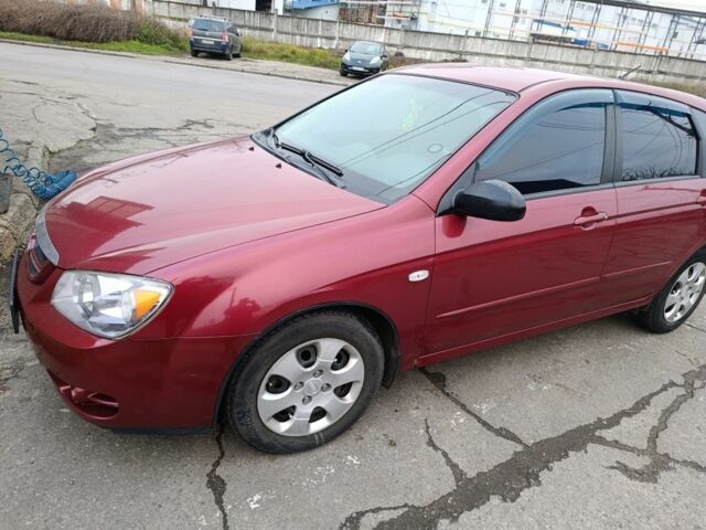 Красный Киа Черато, объемом двигателя 1.6 л и пробегом 230 тыс. км за 4400 $, фото 1 на Automoto.ua