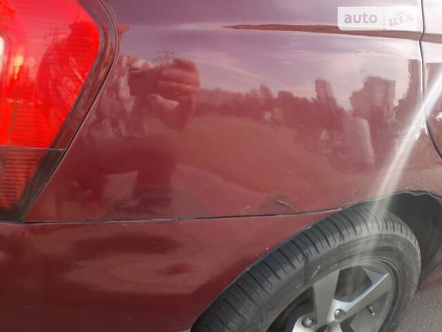 Красный Киа Черато, объемом двигателя 1.6 л и пробегом 210 тыс. км за 4200 $, фото 20 на Automoto.ua
