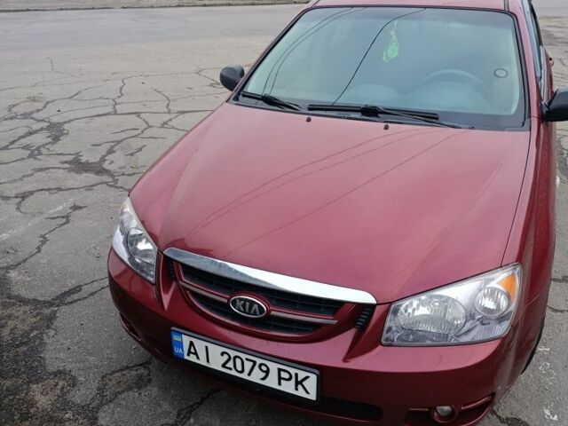 Красный Киа Черато, объемом двигателя 1.6 л и пробегом 230 тыс. км за 4400 $, фото 8 на Automoto.ua