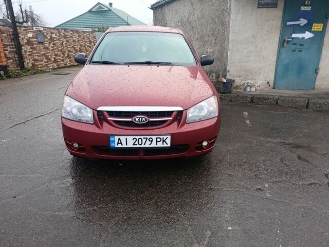 Красный Киа Черато, объемом двигателя 1.6 л и пробегом 230 тыс. км за 4400 $, фото 13 на Automoto.ua