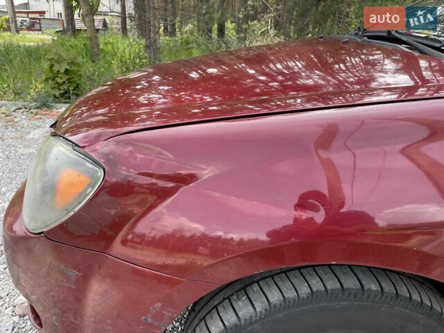 Червоний Кіа Черато, об'ємом двигуна 1.6 л та пробігом 340 тис. км за 2500 $, фото 4 на Automoto.ua