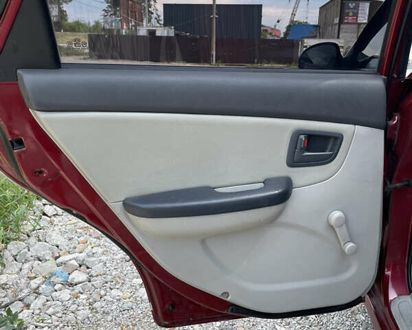 Червоний Кіа Черато, об'ємом двигуна 1.6 л та пробігом 340 тис. км за 2500 $, фото 10 на Automoto.ua