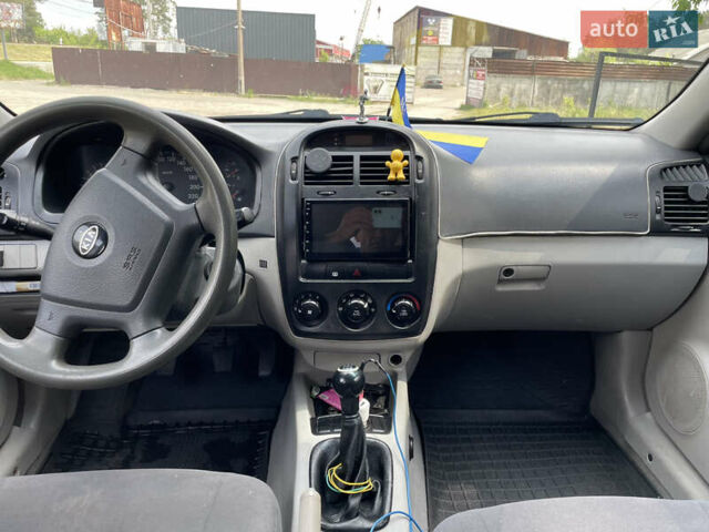 Червоний Кіа Черато, об'ємом двигуна 1.6 л та пробігом 340 тис. км за 2500 $, фото 15 на Automoto.ua